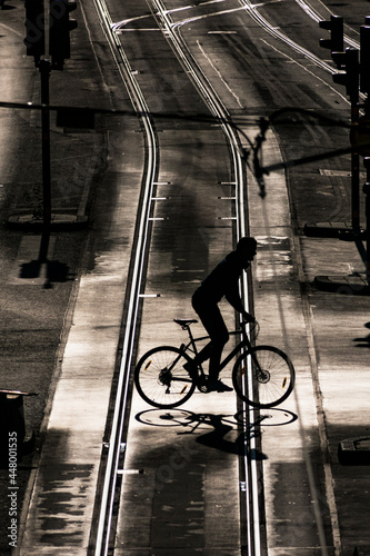 Stockholm, Sweden July 29, 2021 Pedestrians crossing Hamngatan in downtown in the early morning light. photo