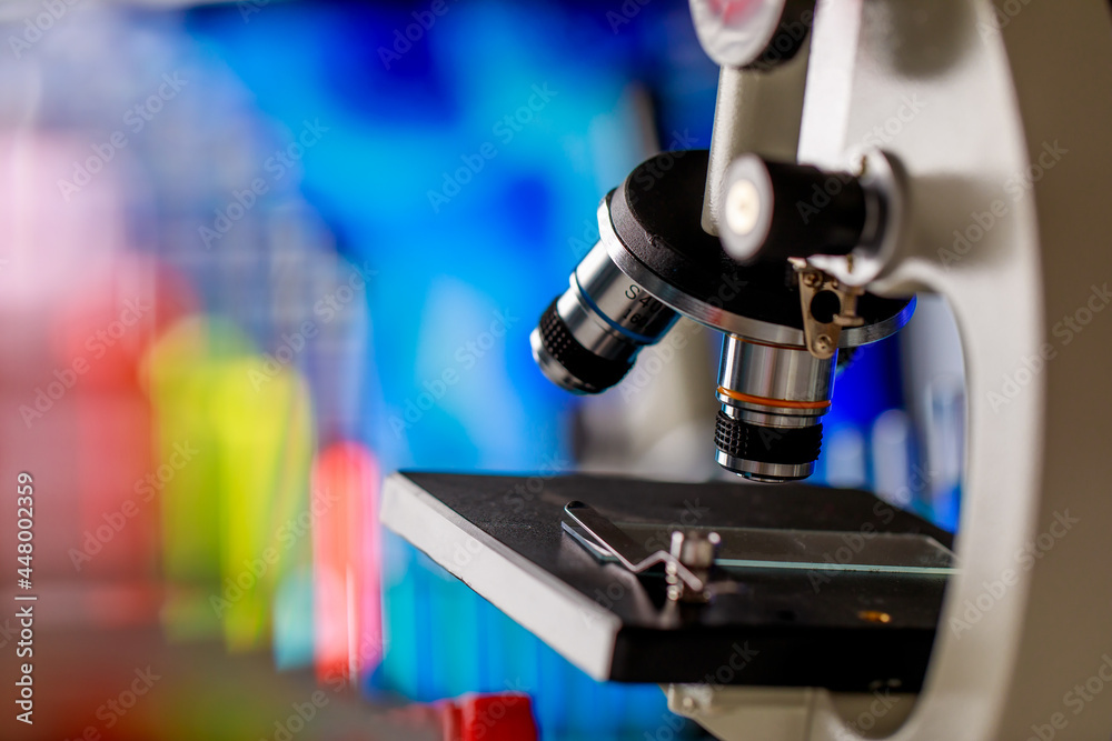Modern scientific microscope with selective lens objectives for various