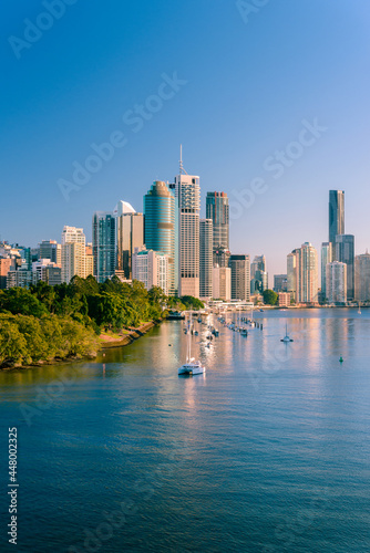 Fototapeta Naklejka Na Ścianę i Meble -  Brisbane city buildings and river seen in early morning light from Kangaroo Point. Brisbane is the state capital of Queensland, Australia.