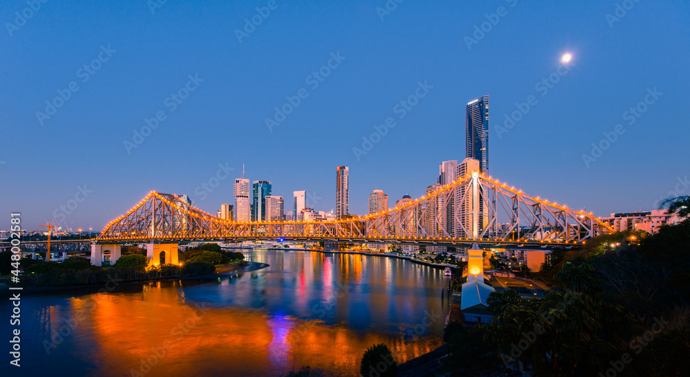 Brisbane city buildings and Story Bridge just before sunrise. Brisbane is the state capital of Queensland, Australia.