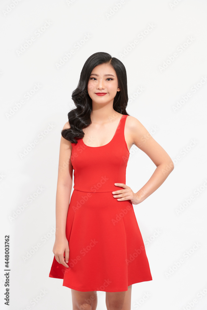 beautiful young woman with long black hair wearing red dress beautiful young woman with long black hair wearing red dress