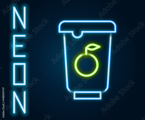 Glowing neon line Yogurt container icon isolated on black background. Yogurt in plastic cup. Colorful outline concept. Vector