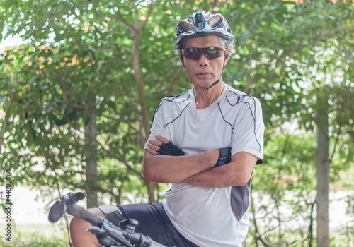active senior male bicyclist portrait