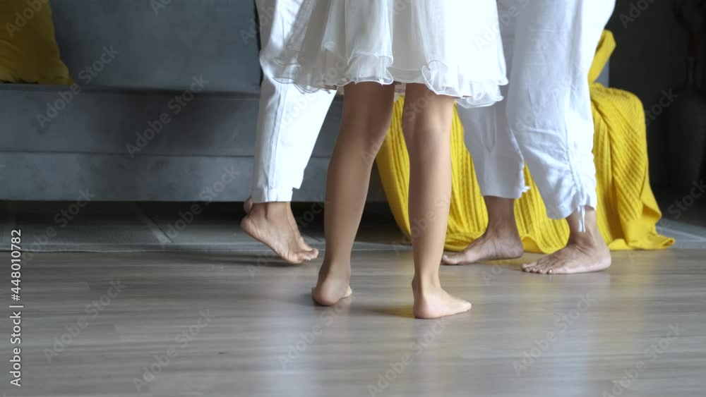 close-up of the legs of a dancing family of women close-up of the legs of a dancing family of women