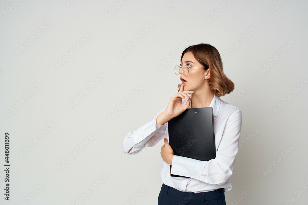 woman in white shirt Major Studio work documents woman in white shirt Major Studio work documents