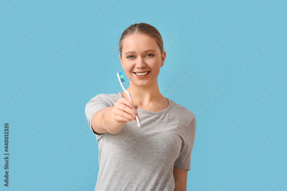 Young woman with tooth brush on color background Young woman with tooth brush on color background