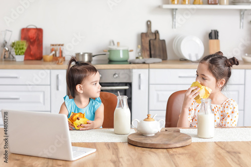 Cute little sisters having ...
