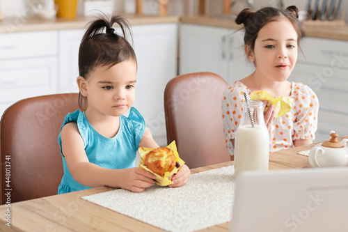 Cute little sisters having ...