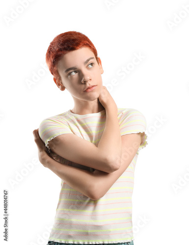 Portrait if non-binary teenager on white background photo