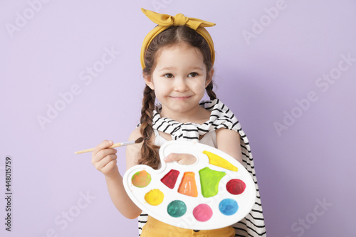 Cute little artist on color...