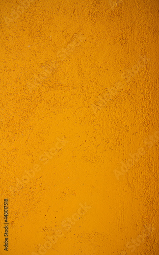 Wall texture with orange paint. Background.