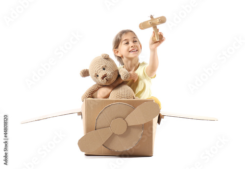 Little girl playing with to...