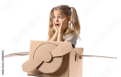 Shocked little girl with ca...