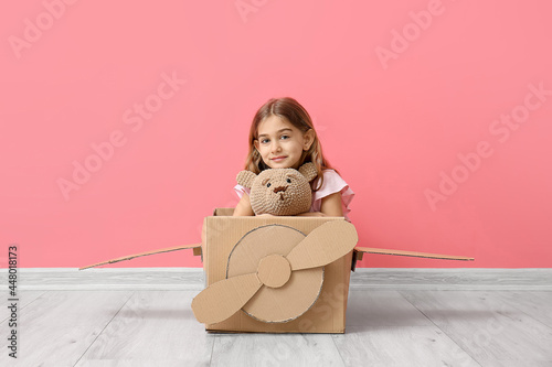 Little girl with toy and ca...