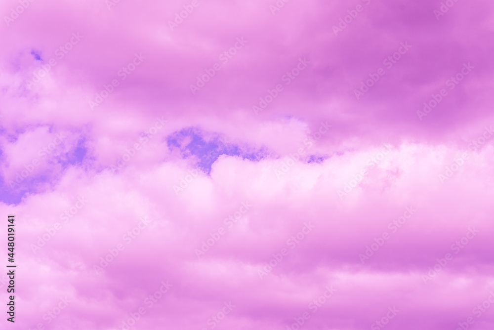 Obraz premium Beautiful dramatic pink cloud sky purple and violet tones Background.Toned.