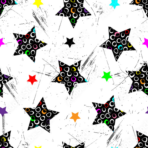 Cool print with multicolored stars on grunge texture.