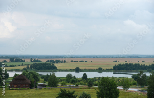 Beautiful cloudy landscape of a Belarusian village