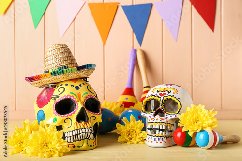 Bilde på lerret Painted human skulls for Mexico's Day of the Dead (El Dia de Muertos), maracas,