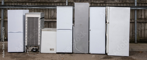 Slika na platnu discarded fridges and freezers at a waste disposal site
