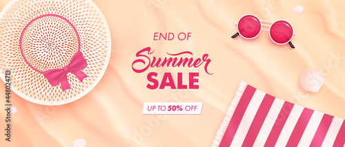 Summer sale horizontal banner. Vector beautiful realistic top view illustration of sandy summer beach with straw hat, beach towel and sunglasses