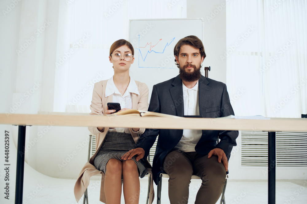 Fototapeta premium business man and woman business colleagues at work harassment problem