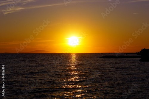 Horizon on seascape at colorful dusk summer sunset