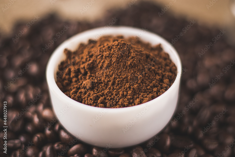Coffee beans and powder with textured background stock image. Coffee beans and powder with textured background stock image.