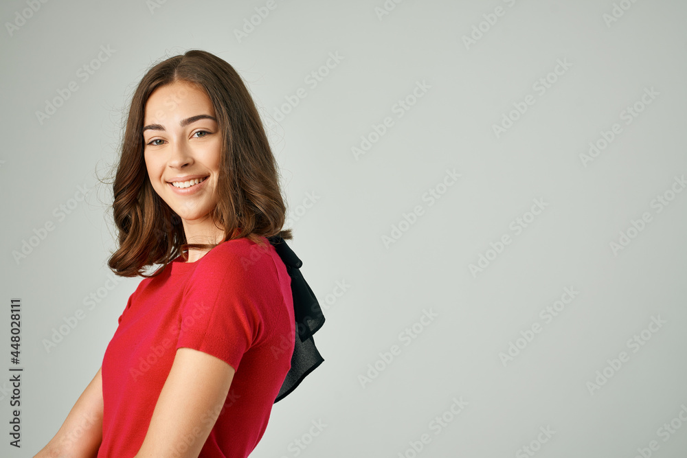cheerful brunette red t-shirt casual wear fashion posing cheerful brunette red t-shirt casual wear fashion posing