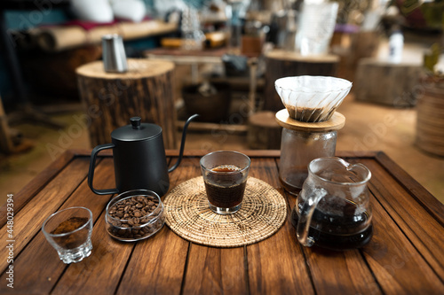 drip coffee on a wooden table at home