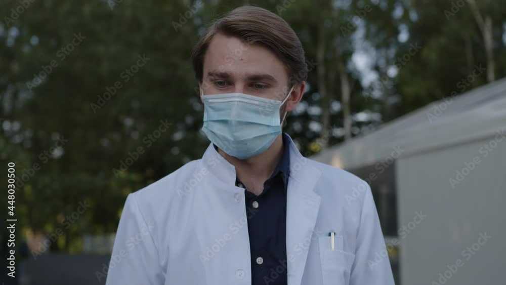 Close up young doctor in blue medical mask Close up young doctor in blue medical mask
