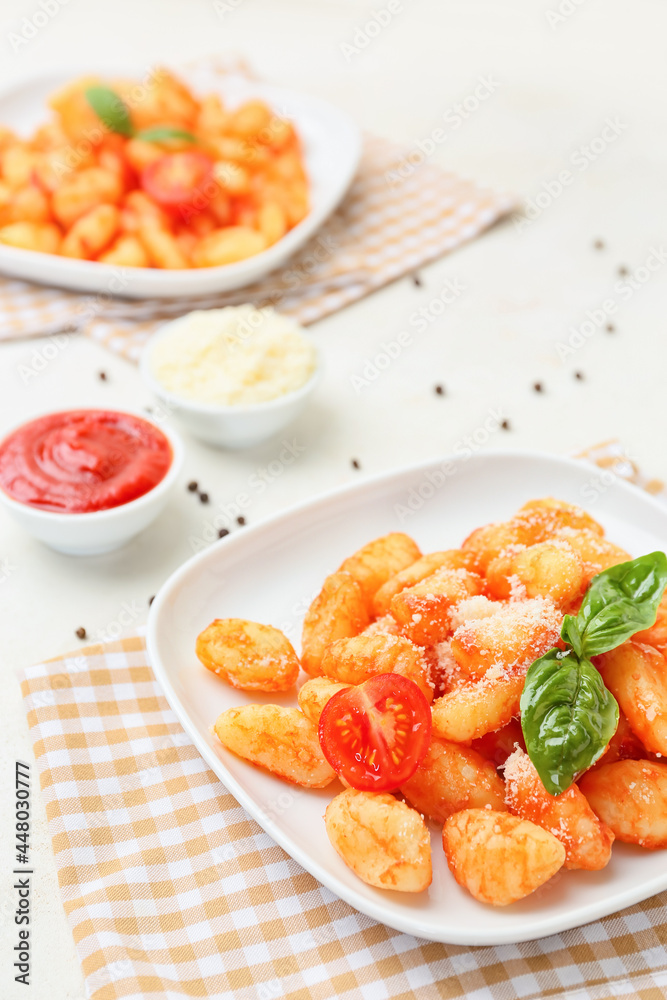 Plate with tasty gnocchi on table Plate with tasty gnocchi on table