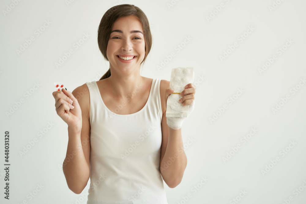 cheerful woman with pills in hands treatment cheerful woman with pills in hands treatment