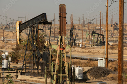 Daytime view of crude oil extraction in Bakersfield, California, USA.