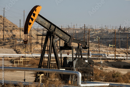 Daytime view of crude oil extraction in Bakersfield, California, USA.
