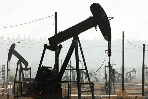 Daytime view of crude oil extraction in Bakersfield, California, USA.