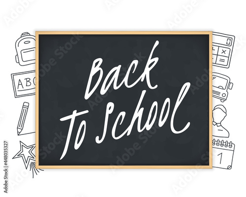 Back to school text on blackboard with hand drawn icons around it