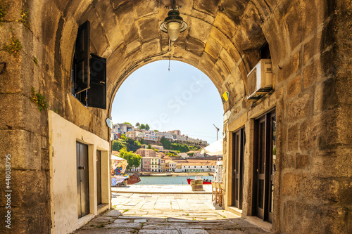 Historic gate to medieval city of Porto with view on Vila Nova de Gaia, Portugal photo