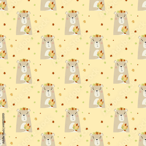Fototapeta Naklejka Na Ścianę i Meble -  Seamless pattern with autumn bear. Cute animal with a bouquet of autumn leaves on a yellow background. Vector illustration in flat style for design, decor, textile and wallpaper, Packaging, decoration