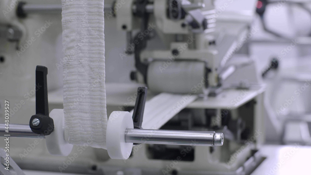 Machine producing in textile factory Machine producing in textile factory