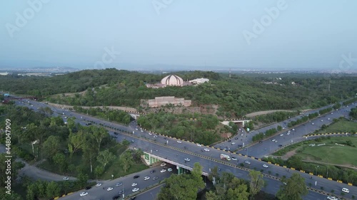 Aerial shot of Pakistan Monument with busy road Zero Point Islamabad Pakistan