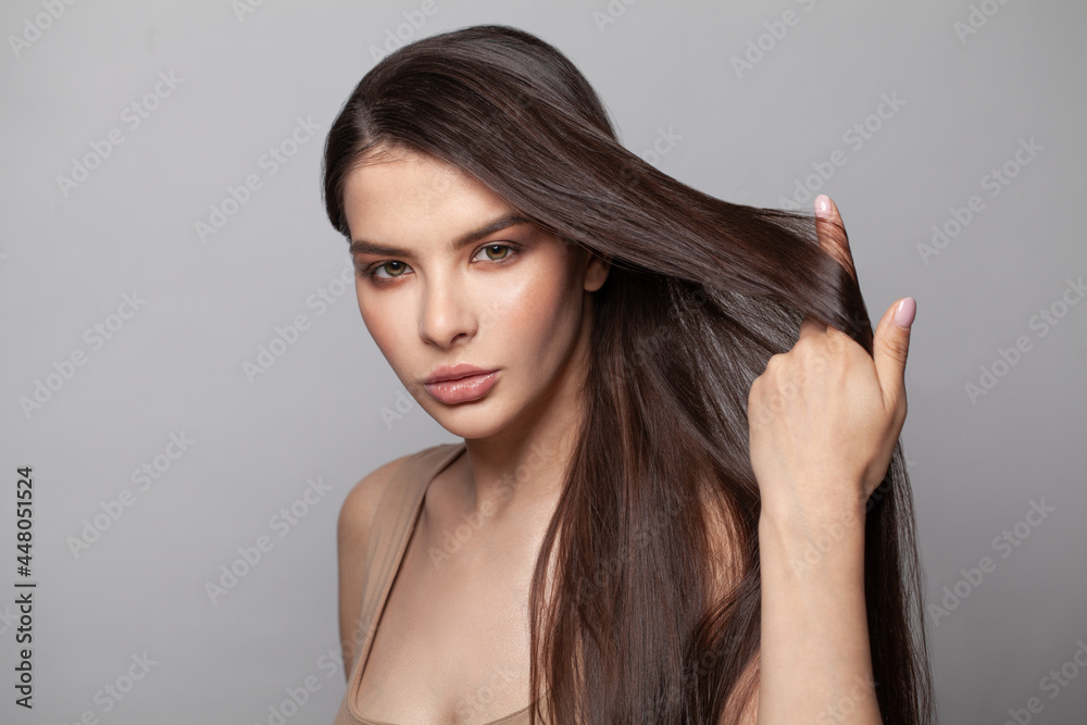 Naklejka premium Close up portrait of healthy young beautiful wonderful lady with long perfect shiny smooth straight hair