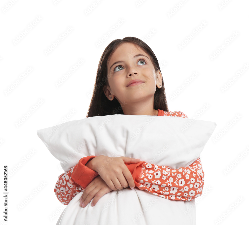 Cute girl wearing pajamas with pillow on white background Cute girl wearing pajamas with pillow on white background