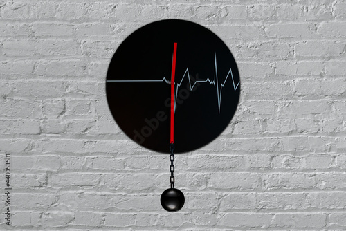 Clock hang at a white brick wall and is forced to stand still with a pointer chaned to a heavy, black metal sphere (ID: 448053581)