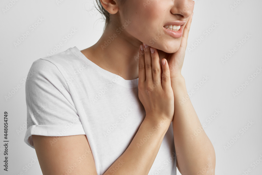 woman toothache in white t-shirt health problems dentist