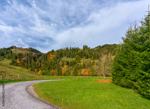 Autumn in the eastern foothills of the Alps  Foralpen  on the shores of Lake Schwarzsee and the alpine valley of the Brekka Abis formed by glaciers.
