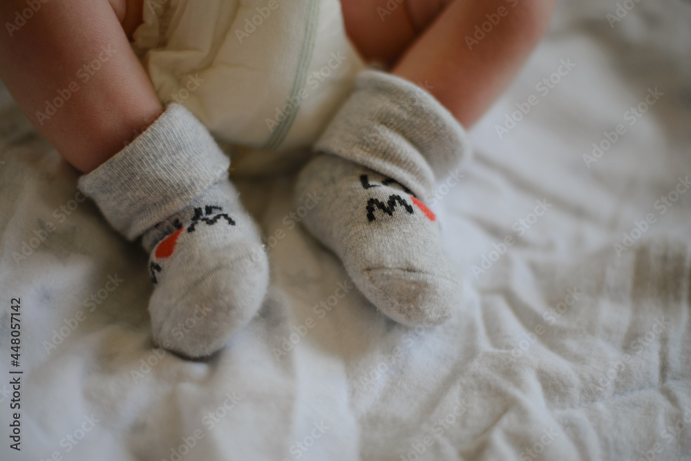 child holding teddy bear