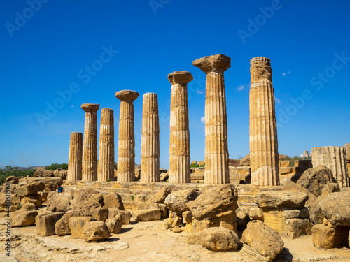 Doric Order columns standing by other remains of the Temple of Heracles in Valle dei Templi