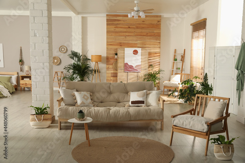 Spacious apartment interior with stylish wooden furniture. Idea for design © New Africa