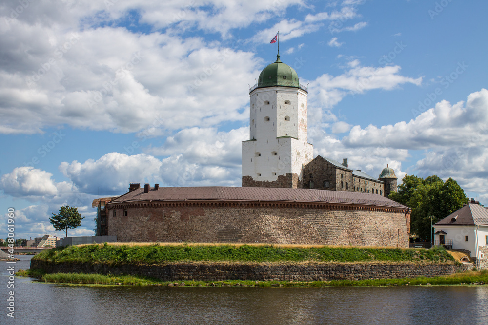 Olaf Tower in the historical center of the city on a summer cloudy day and a space for copying in Vyborg Russia