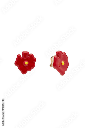 Subject shot of two bright summer earrings made as red poppy flowers in Japanese style. The pair of clip earrings is isolated on the white background. © RedUmbrella&Donkey